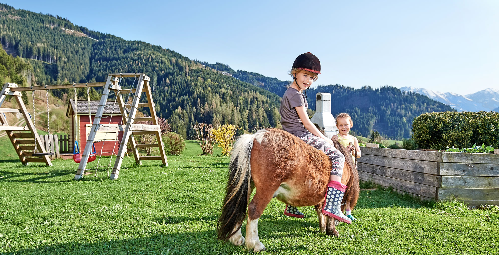Kind beim Reiten auf dem Bauernhof Bichlgut in Bischofshofen